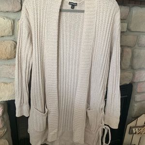 Cardigan with pockets and tie up sides